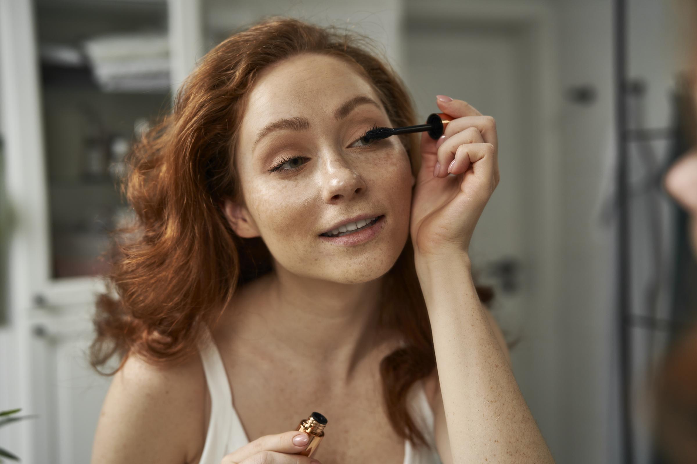 A woman applying mascara | Source: Getty Images