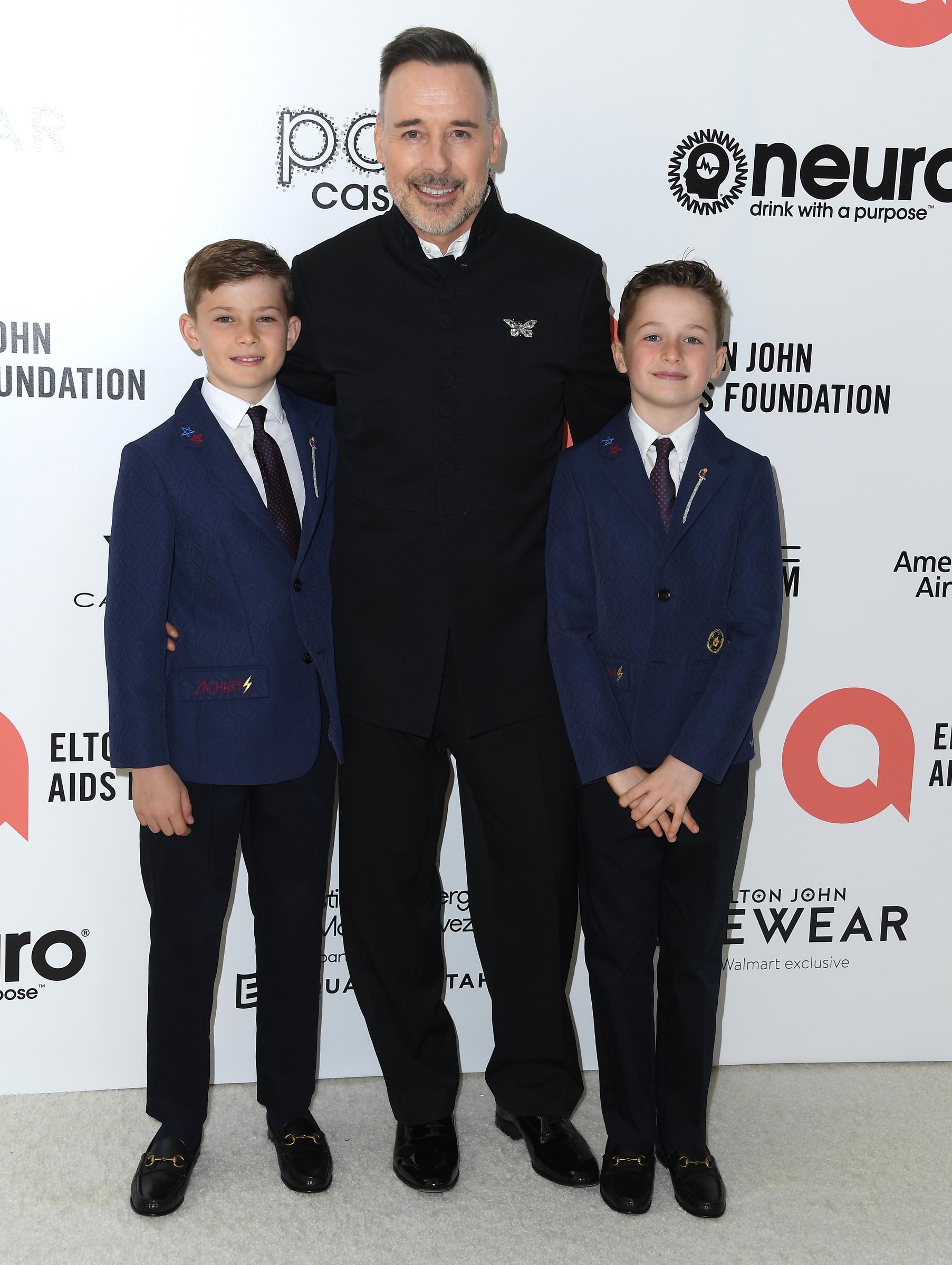 David Furnish with sons Zachary and Elijah at the Elton John AIDS Foundation’s 30th Annual Academy Awards Viewing Party in West Hollywood, California on March 27, 2022. | Source: Getty Images
