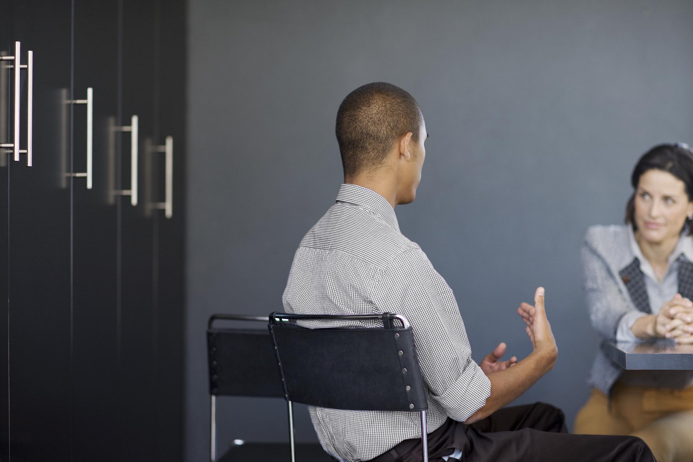 A man answering a question during an interview | Source: Getty Images