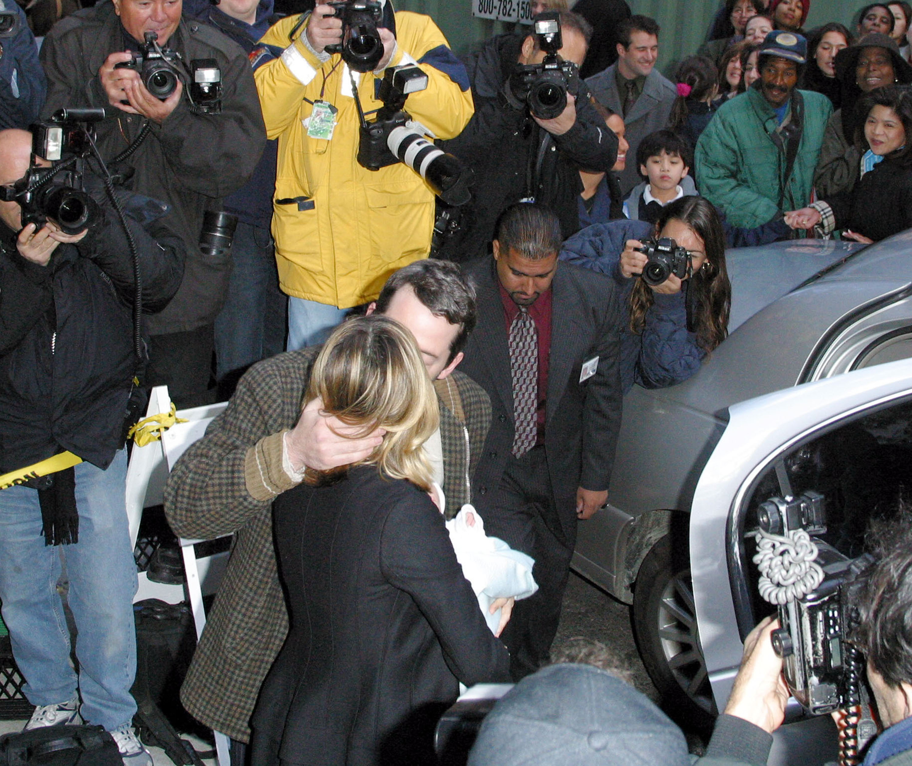 Public attention began almost immediately for James, with photographers and onlookers surrounding his parents during their first days with him. | Source: Getty Images.