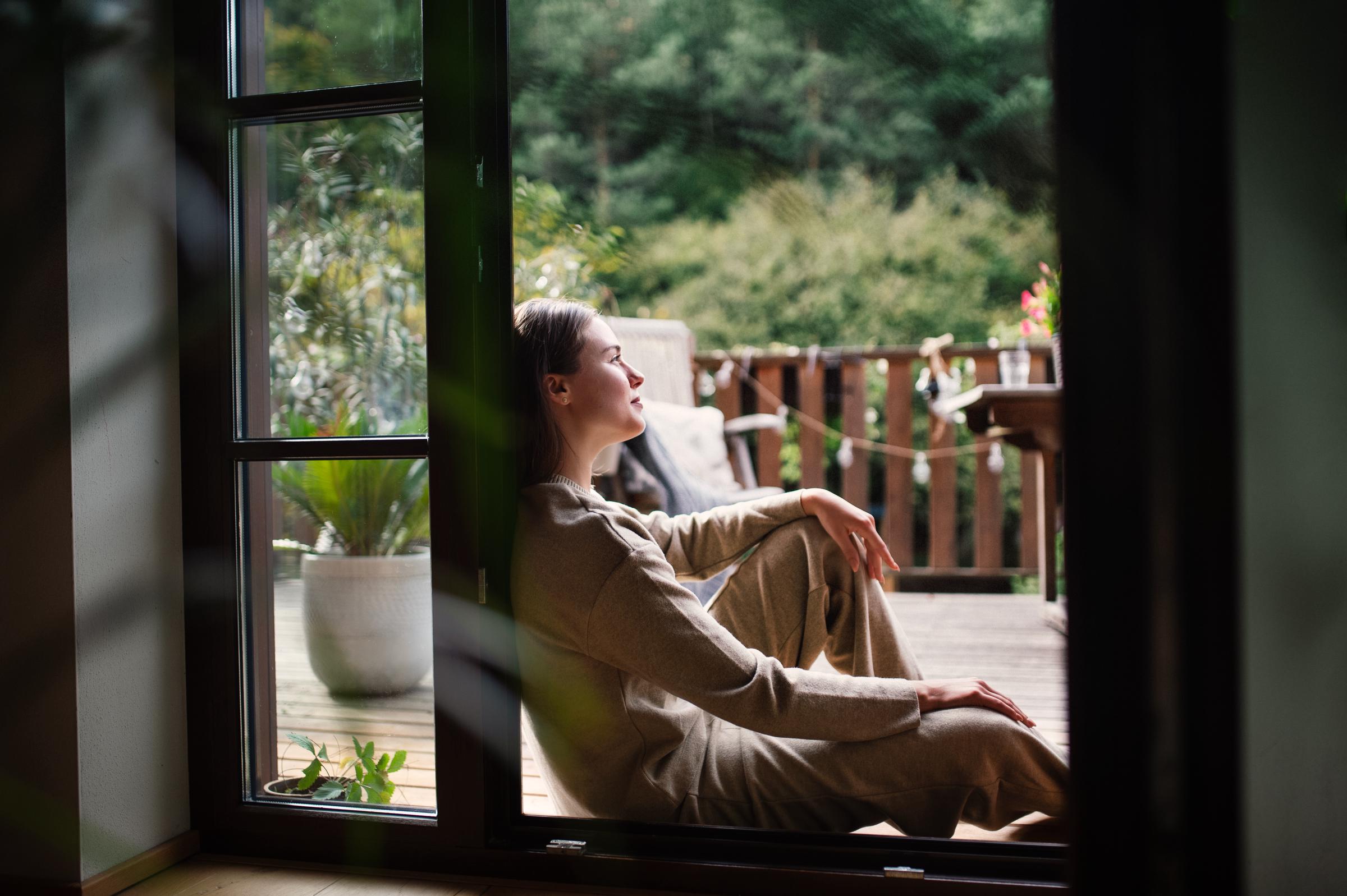 A woman relaxing on her balcony | Source: Getty Images