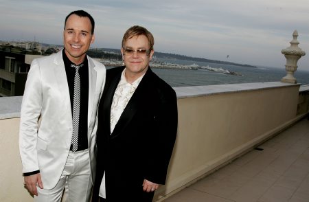 Producer and musician Sir Elton John (R) and his husband, producer David Furnish. | Source: Getty Images