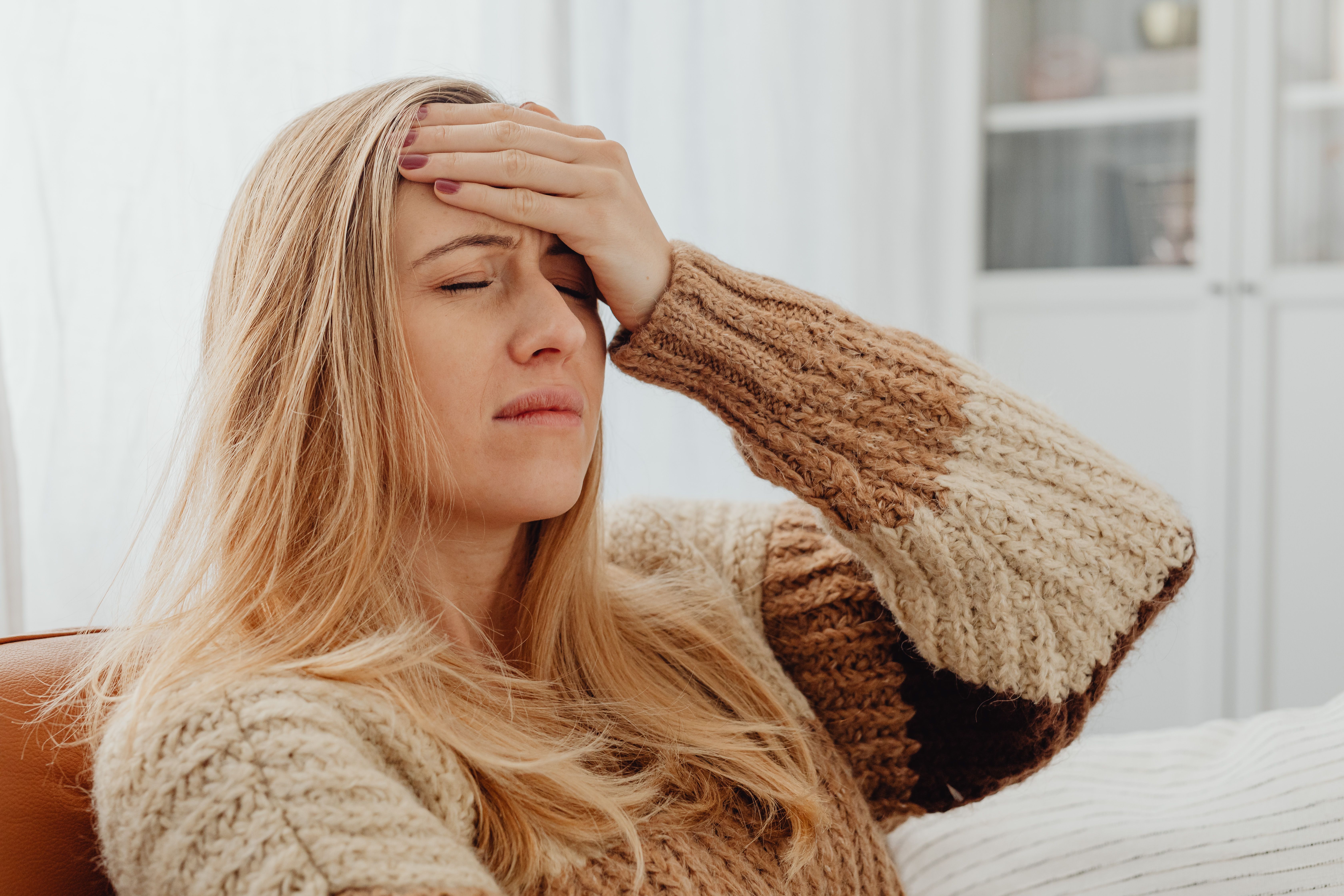 A woman suffering from a migraine | Source: Pexels