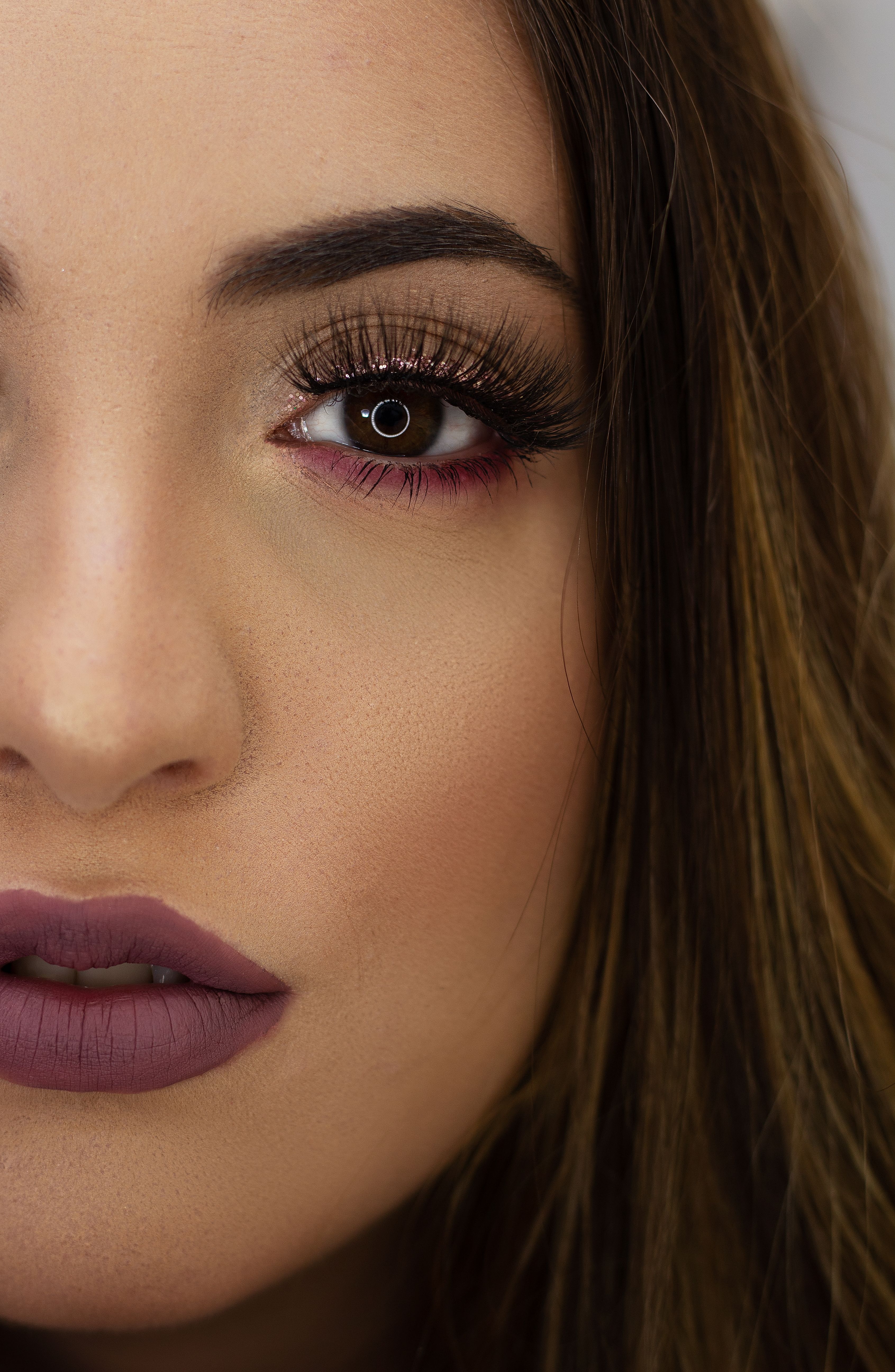 Woman with burgundy eyeliner | Source: Pexels