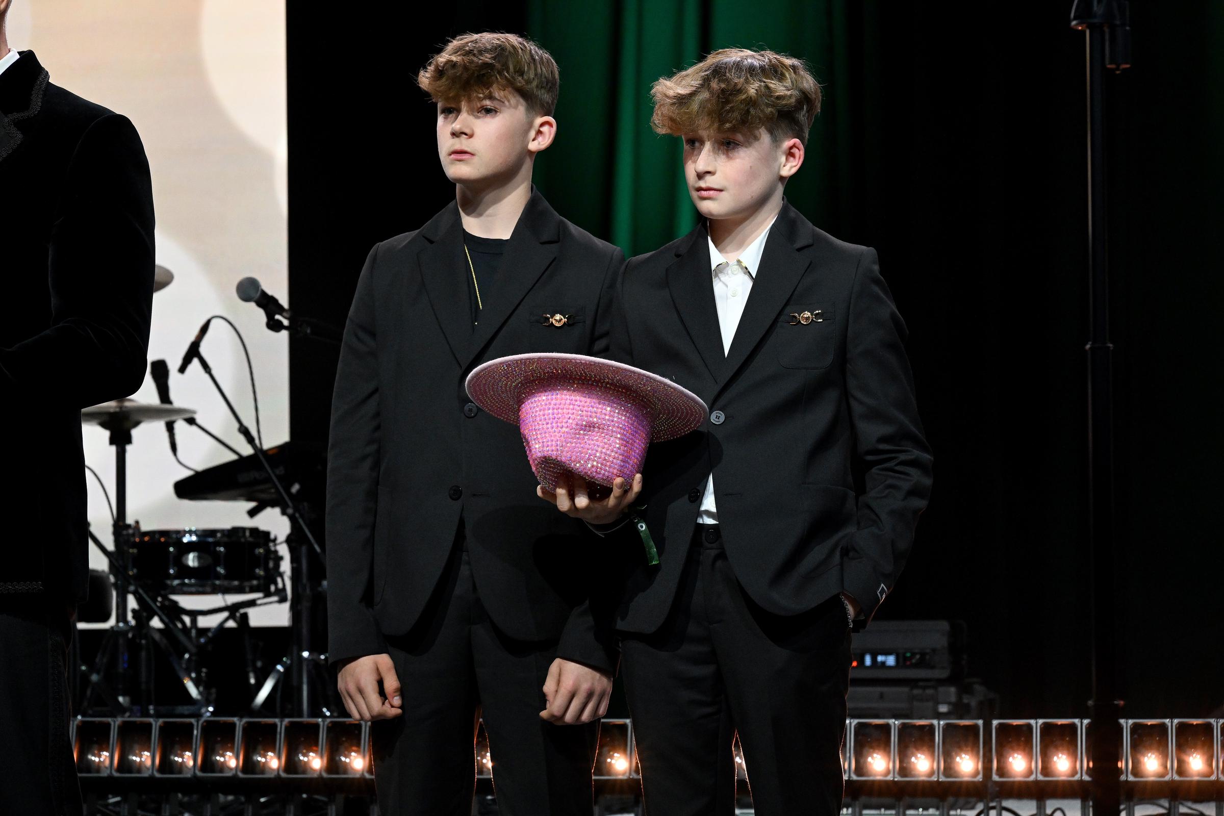 Zachary and Elijah Furnish-John speak onstage at the Elton John AIDS Foundation viewing party on March 2, 2025 | Source: Getty Images