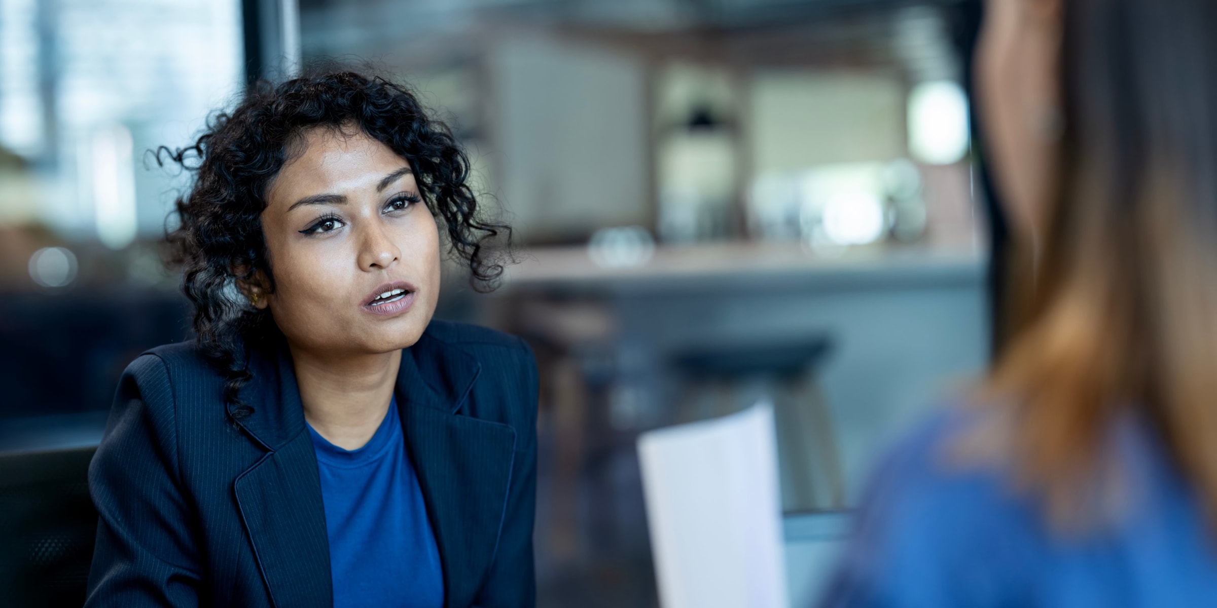 A woman speaking during an interview | Source: Getty Images