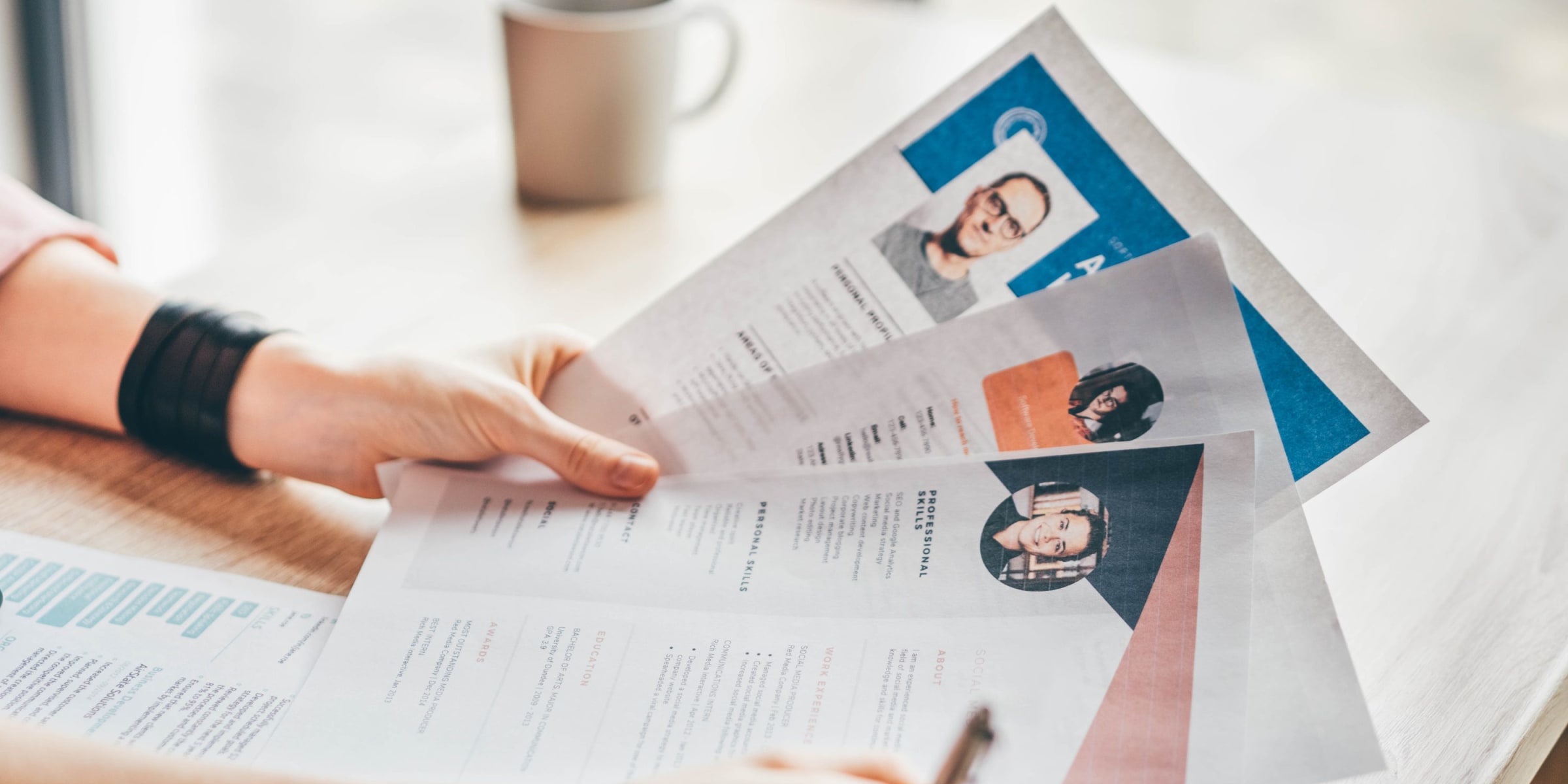 A recruiter looking at resumes | Source: Getty Images